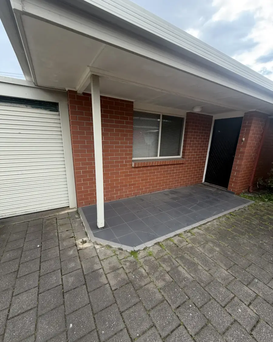 After: Empty unit courtyard and porch